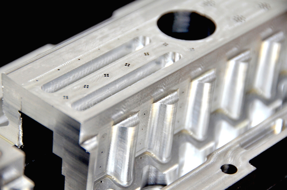 Detail eines gefrästen Metallbauteils aus dem TMB-Bildarchiv